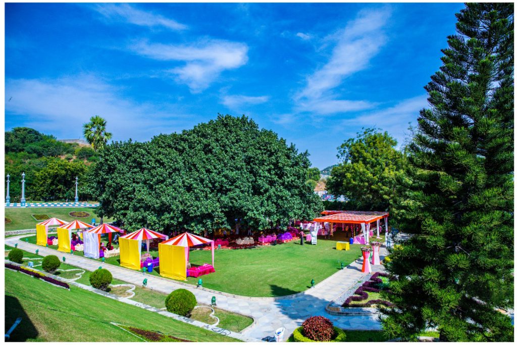 Beautiful lawn and outside wedding venues in Hyderabad at Ramoji Film City with vibrant decor and greenery.